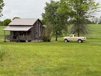 A peaceful walk around the yard got me this cool pic of my truck with the cabin