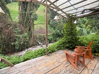 River runs through the back of the property