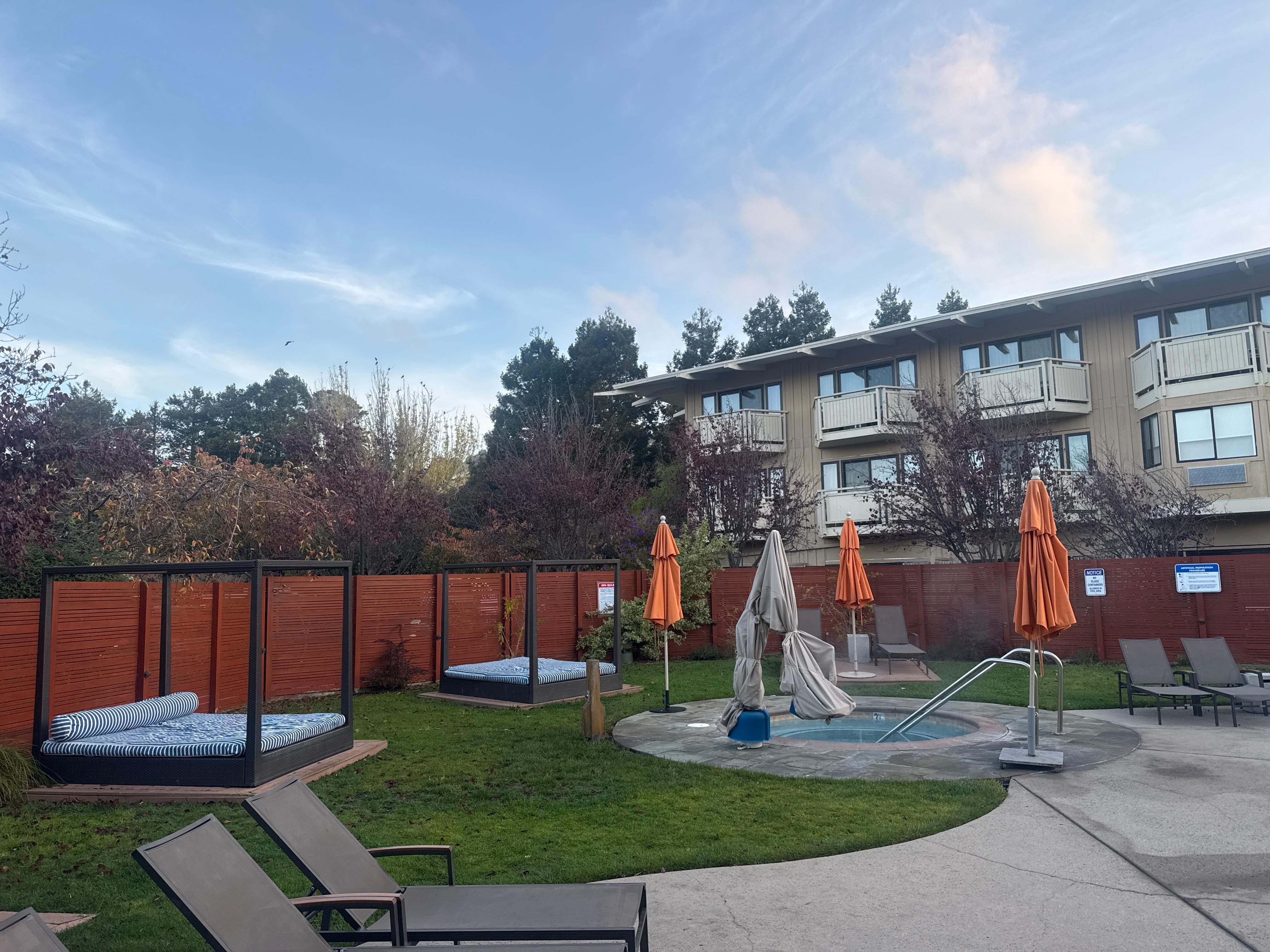 Clean and nice hot tub area with extra towels