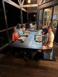This large table and bench on the deck was our favorite! Perfect for large family meals alfresco.