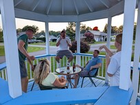 Enjoying after dinner chats in the gazebo.