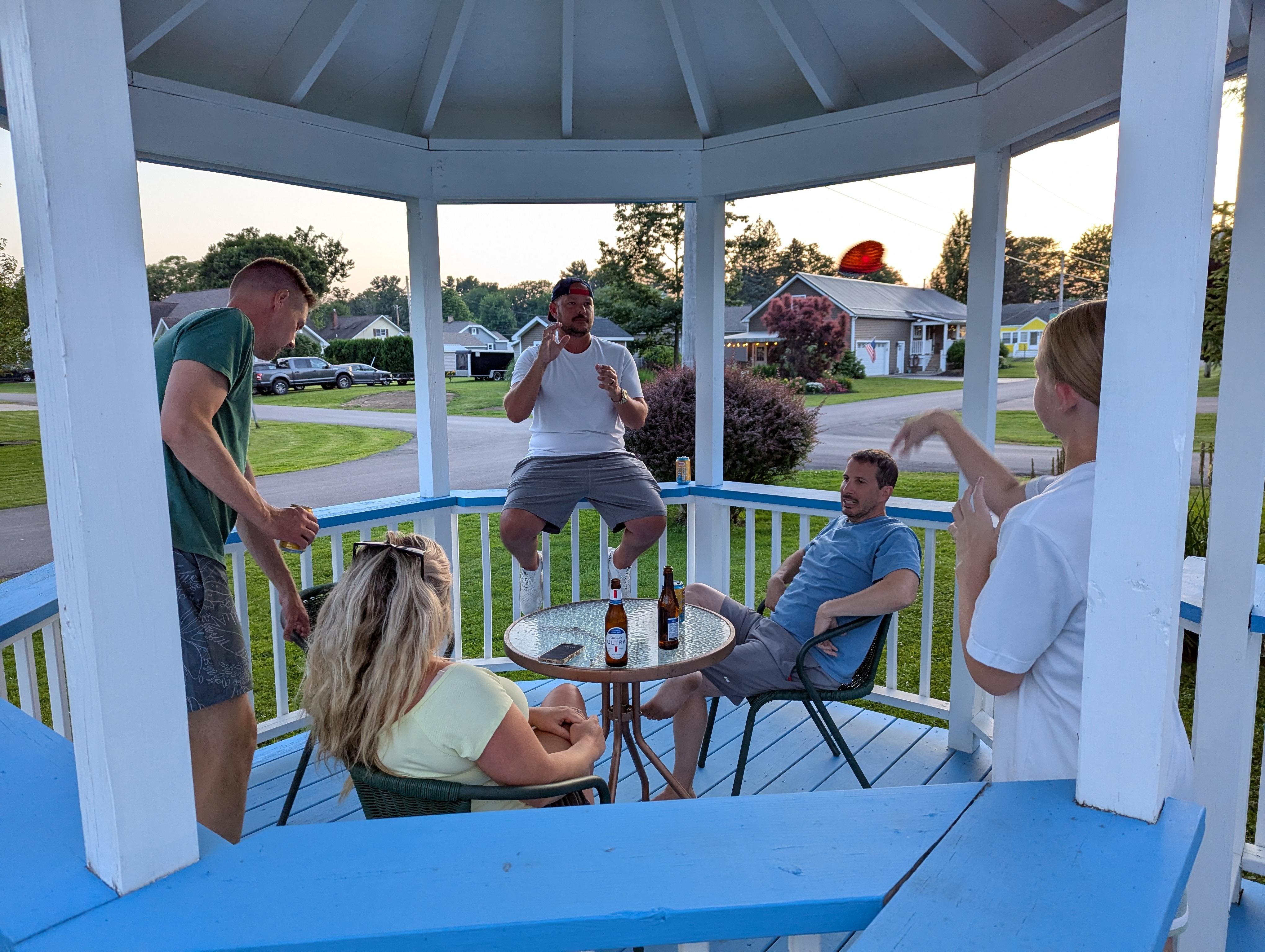 Enjoying after dinner chats in the gazebo.