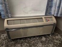 Duct tape on the filthy AC unit that barely worked