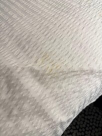 Stains on the sheets before laying in the bed