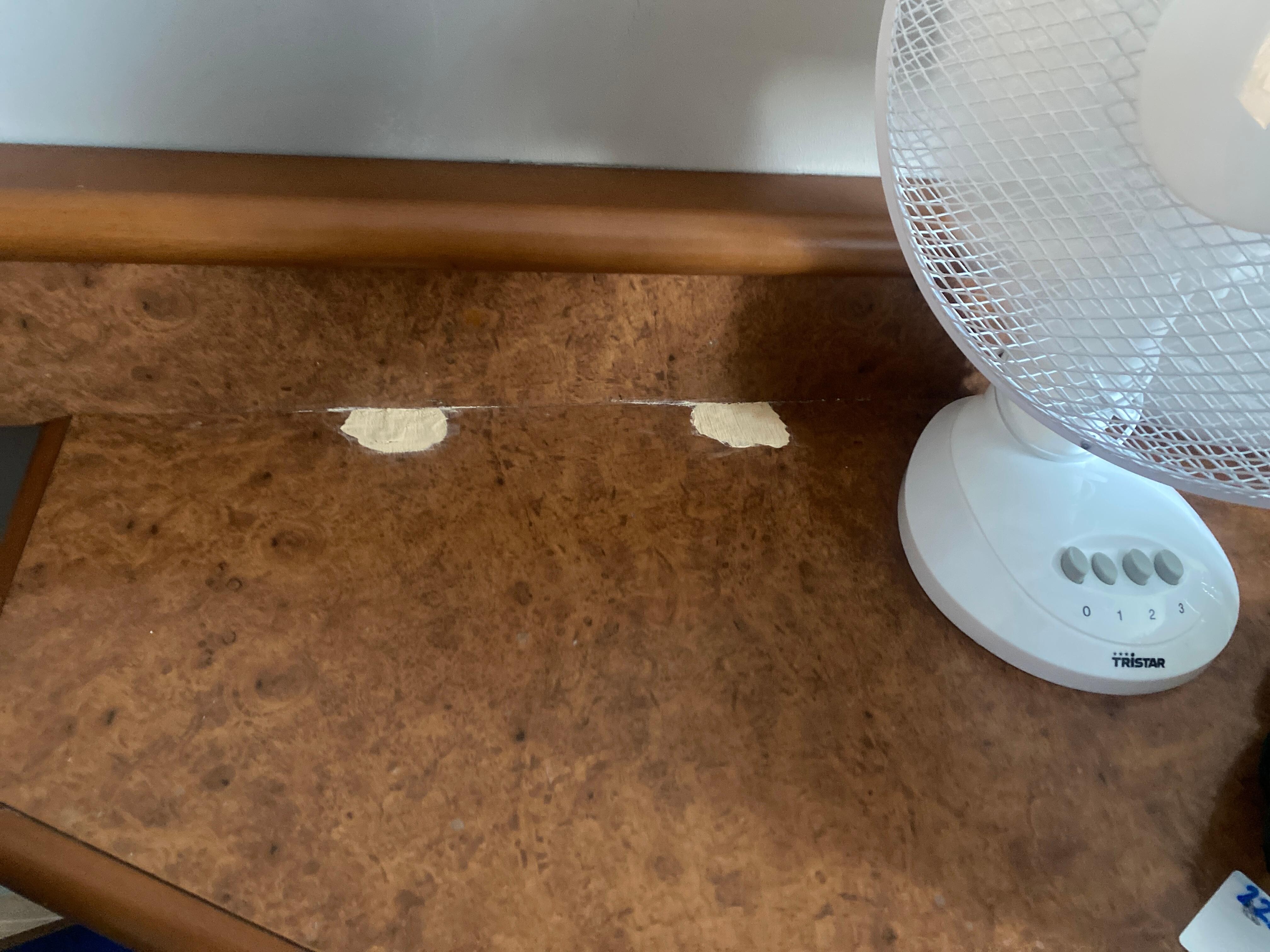 Holes/ fillers in desk top 