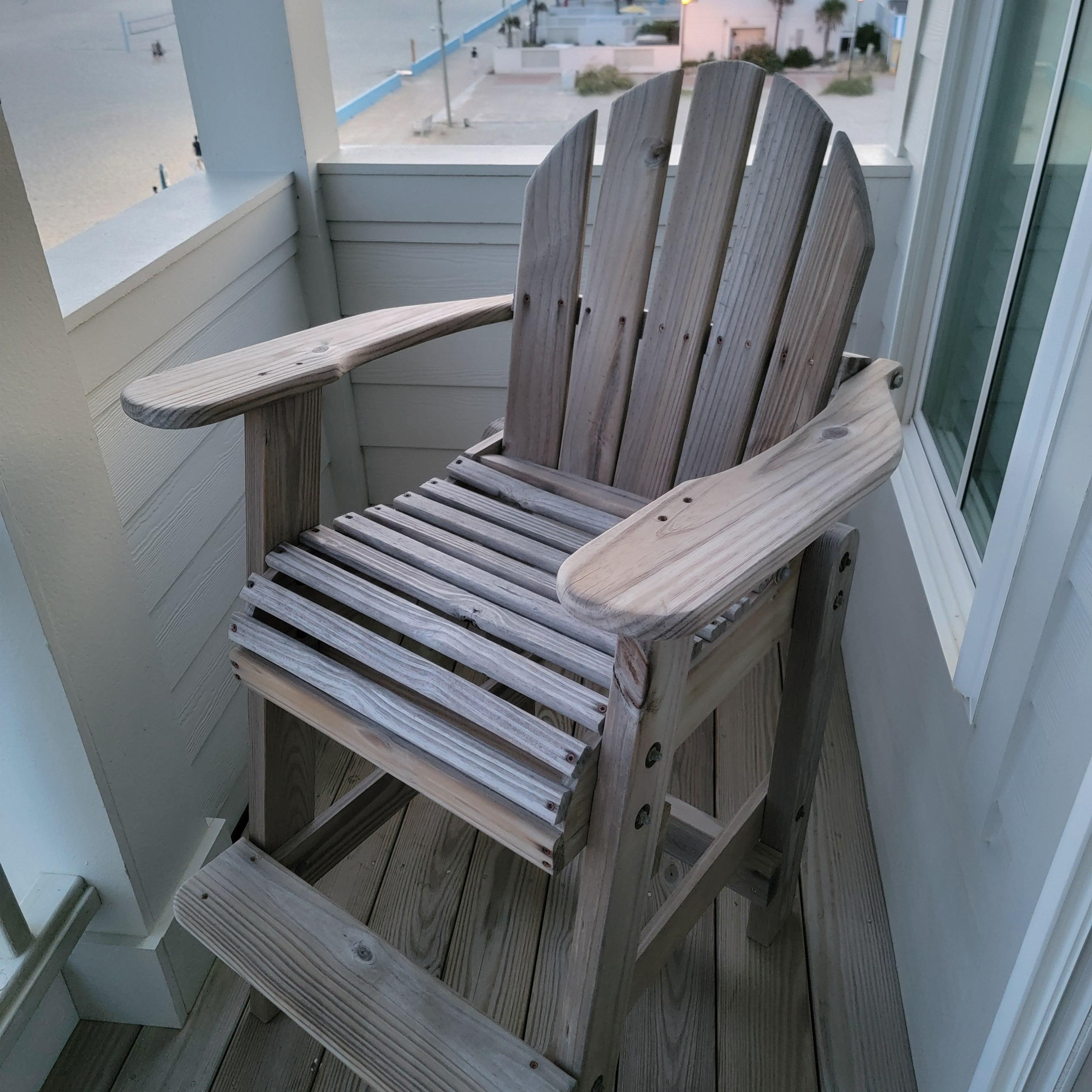 Great Adirondack style chairs off each ocean facing room.