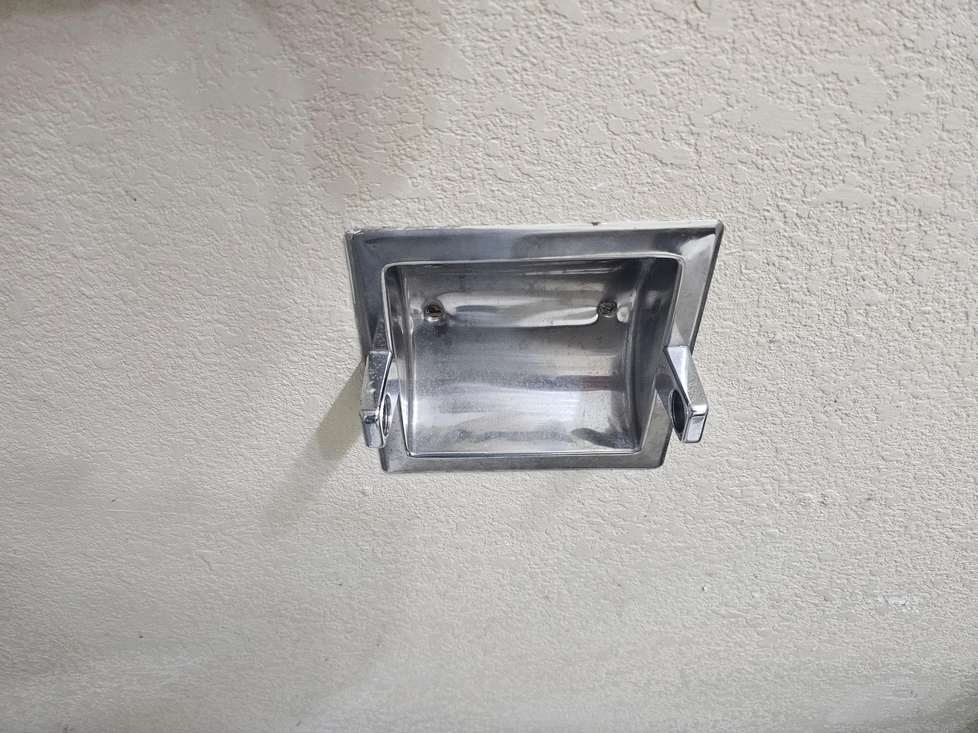 No roll holder- had to be on counter next to sink to reach. 