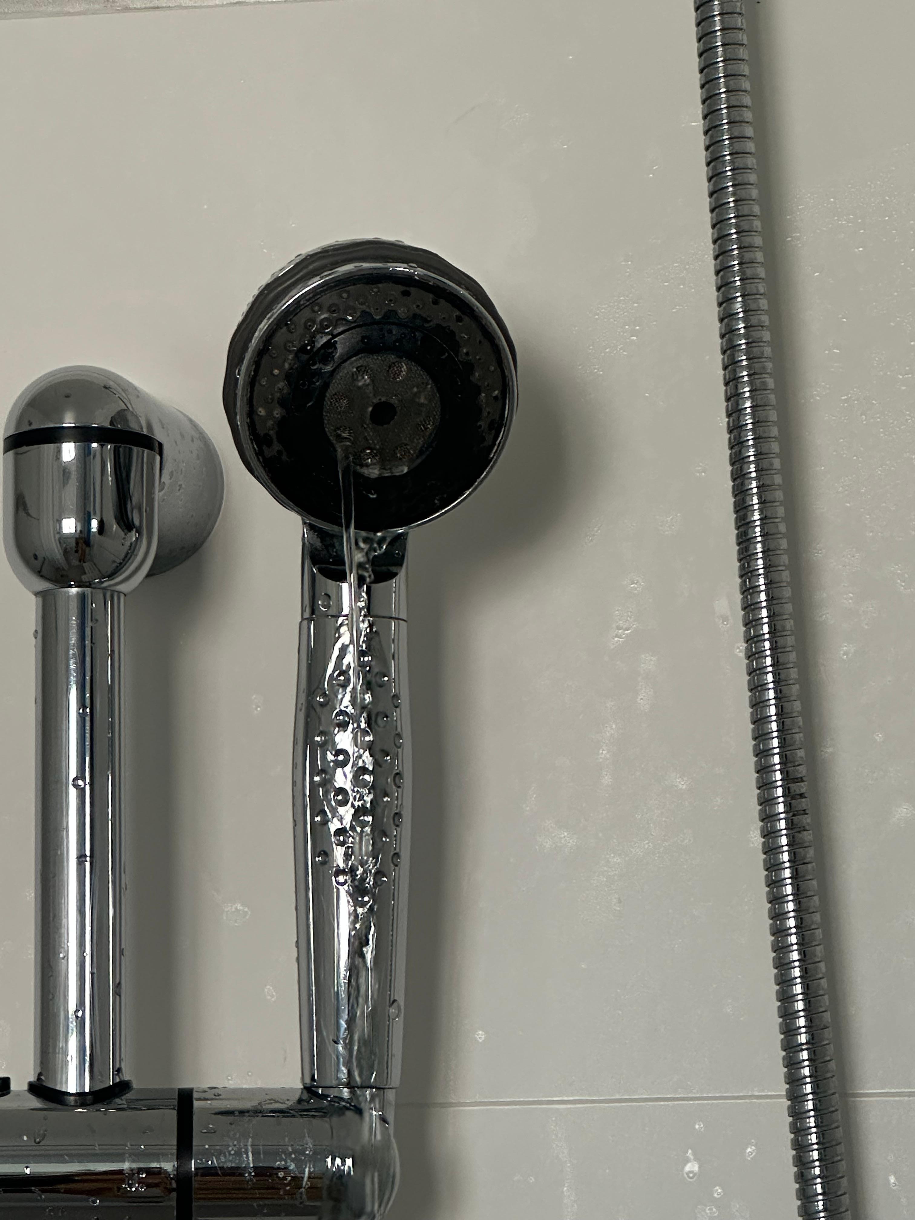 Second shower head with the water coming out