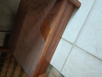 A pile of dust under the microwave stand