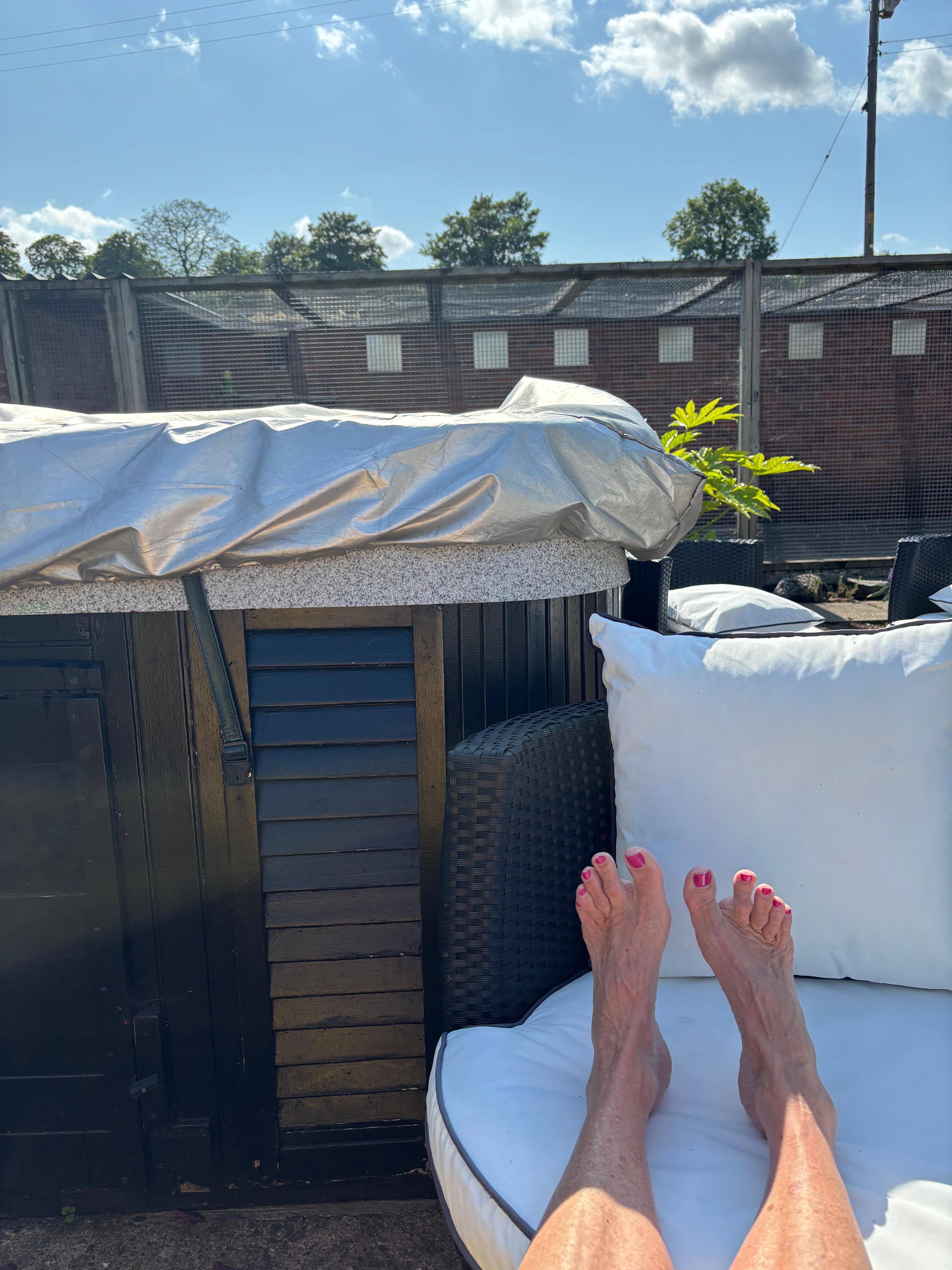 Hot tub and sunning, the perfect day
