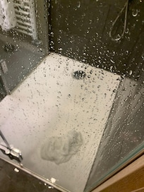 Rain shower didn’t work, hand shower splattered and flood the bathroom floor