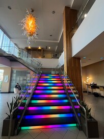 Rainbow stairs and cool chandelier!