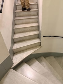 Very dangerous, awkward steps from the stairs to the apartment.