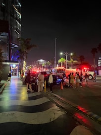 Firemen and people lost and unsure what to do.