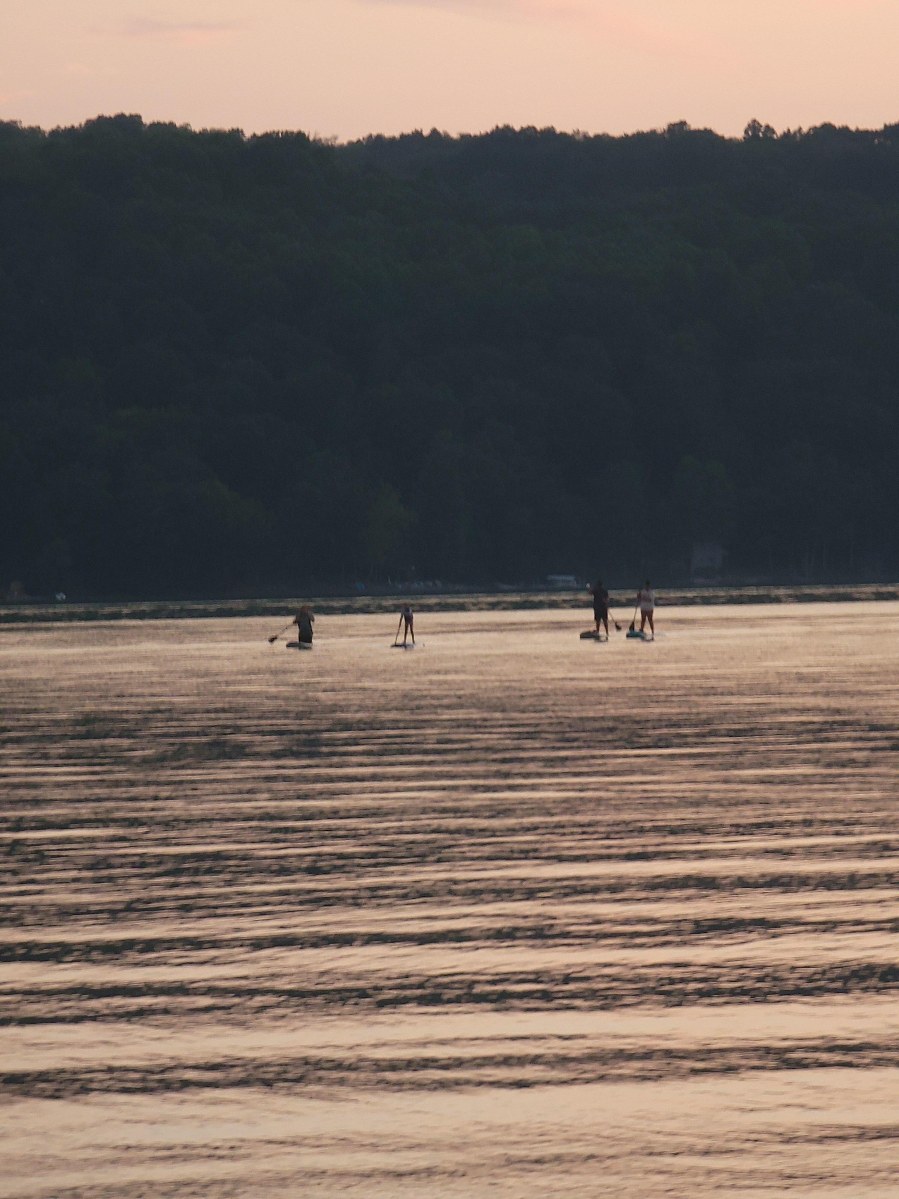 Paddle boarding at sunset