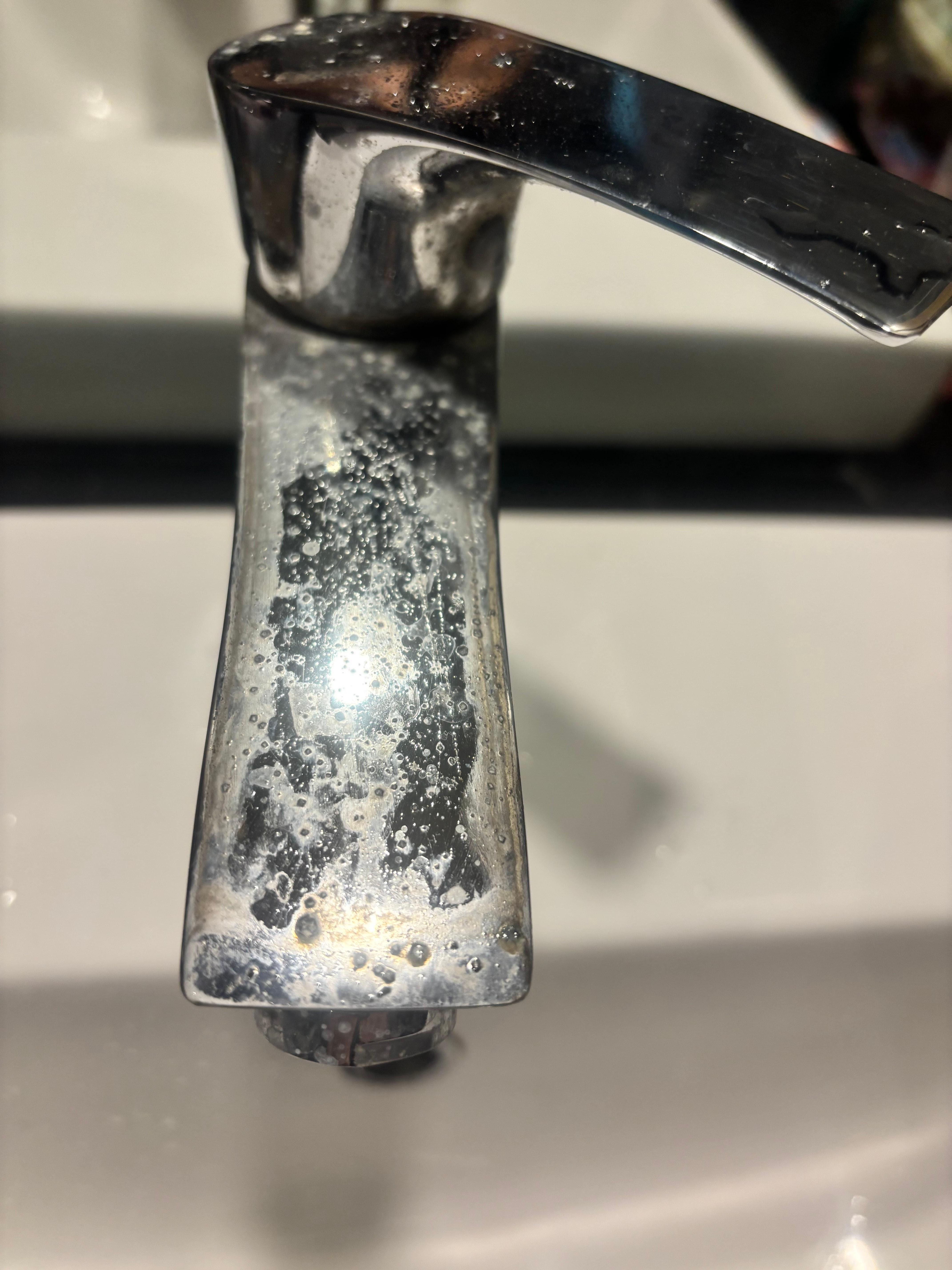 Bathroom tap with the chrome blistered