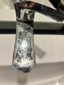Bathroom tap with the chrome blistered