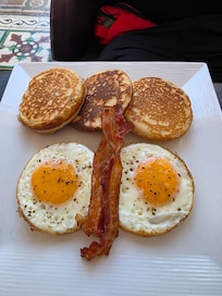 Breakfast, eggs, pancakes and bacon