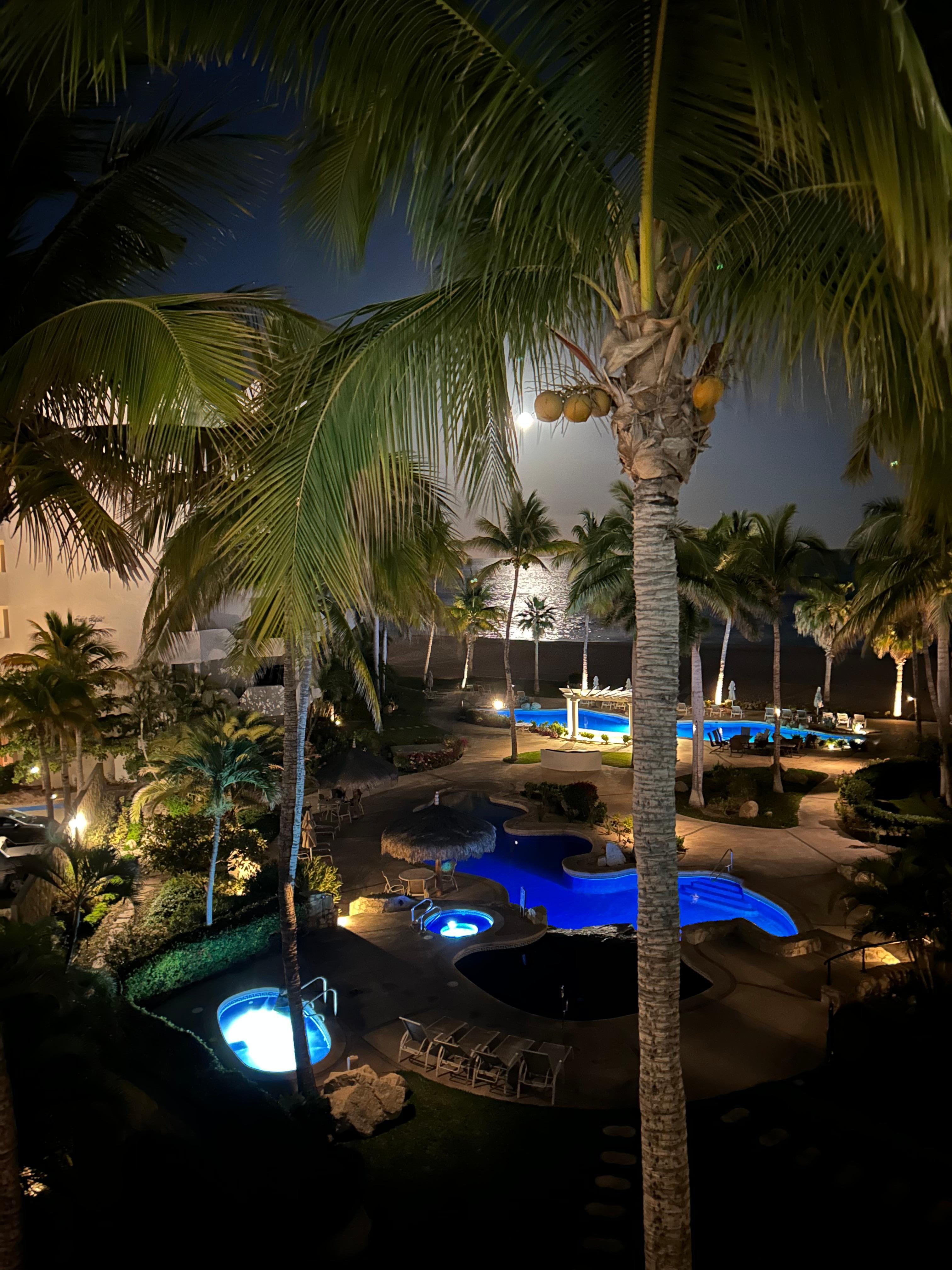 Moon shining over the water.