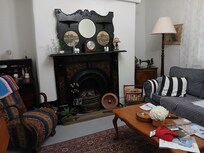 One of the sitting areas, great mantelpiece