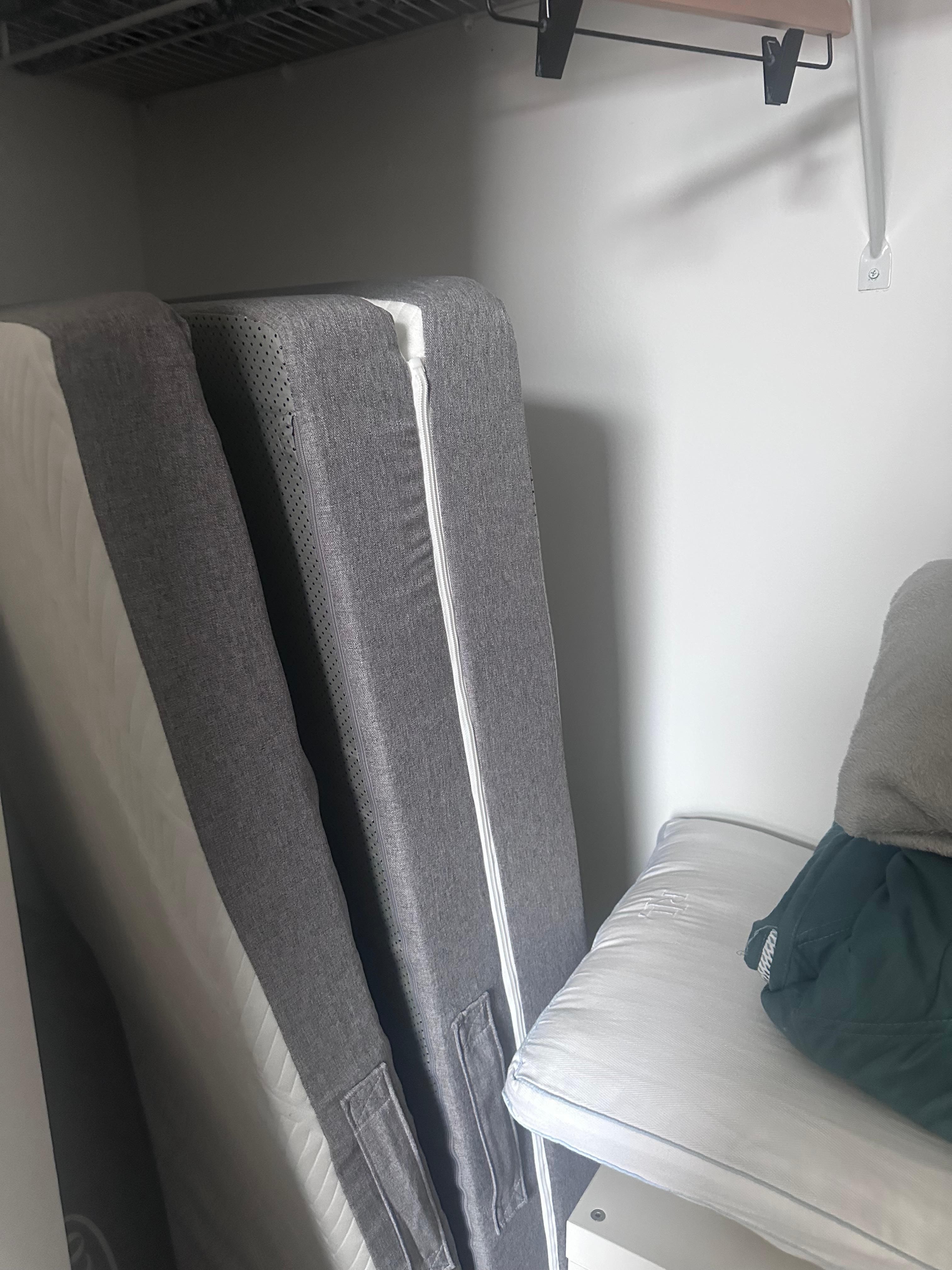 Closet stuffed with random stuff 