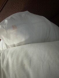 stains on the pillow.