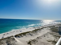View from balcony and floor to ceiling windows.