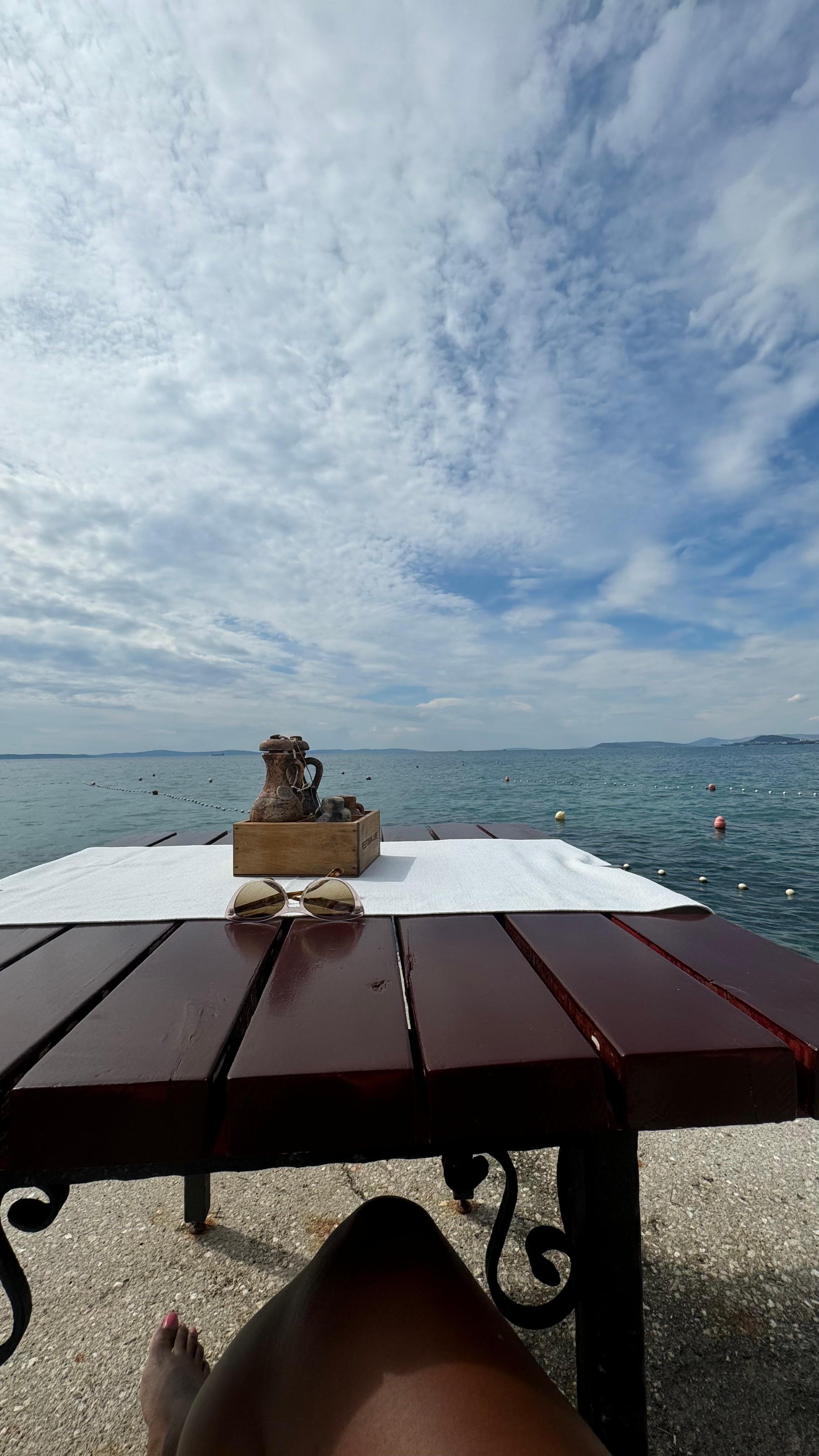 Table on the pier of restaurant Jure