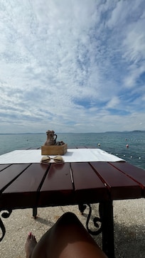 Table on the pier of restaurant Jure
