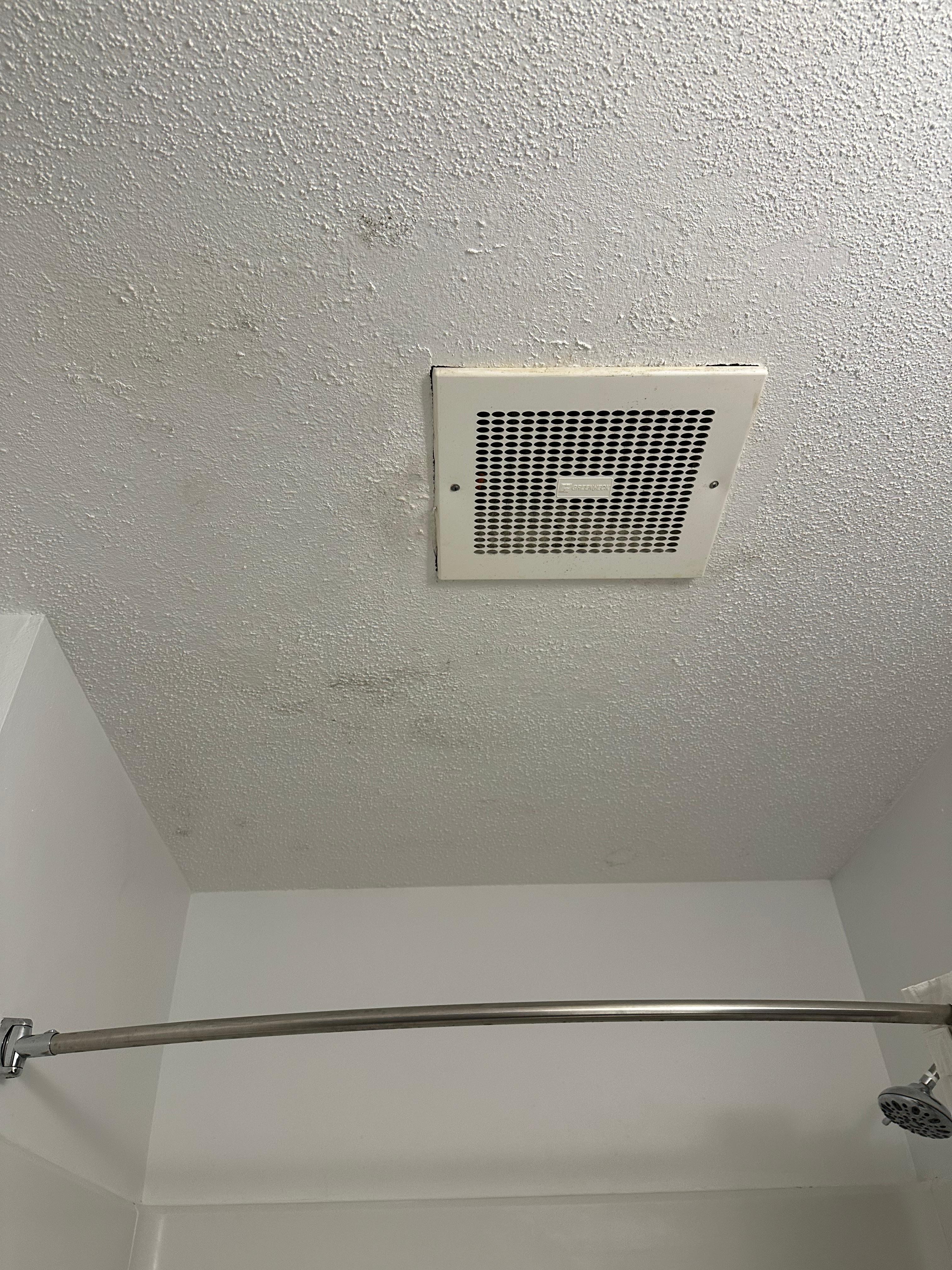 Black stuff on ceiling in the bathroom 