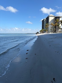 On the beach in front of the property