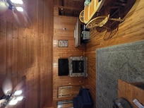 Living area, with Air Hockey and electric fireplace