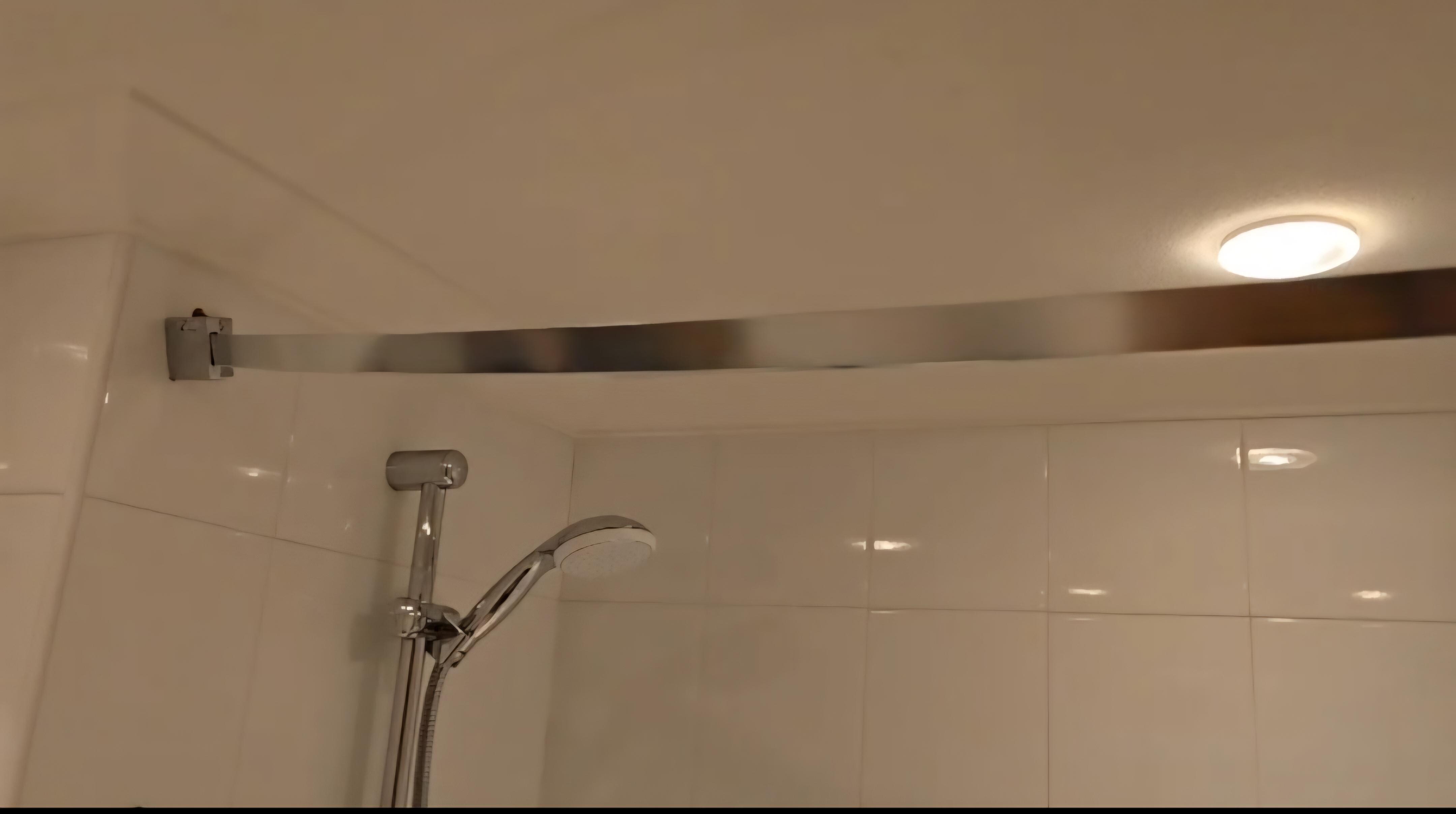 Very loose shower rail. This picture doesn't do it justice.