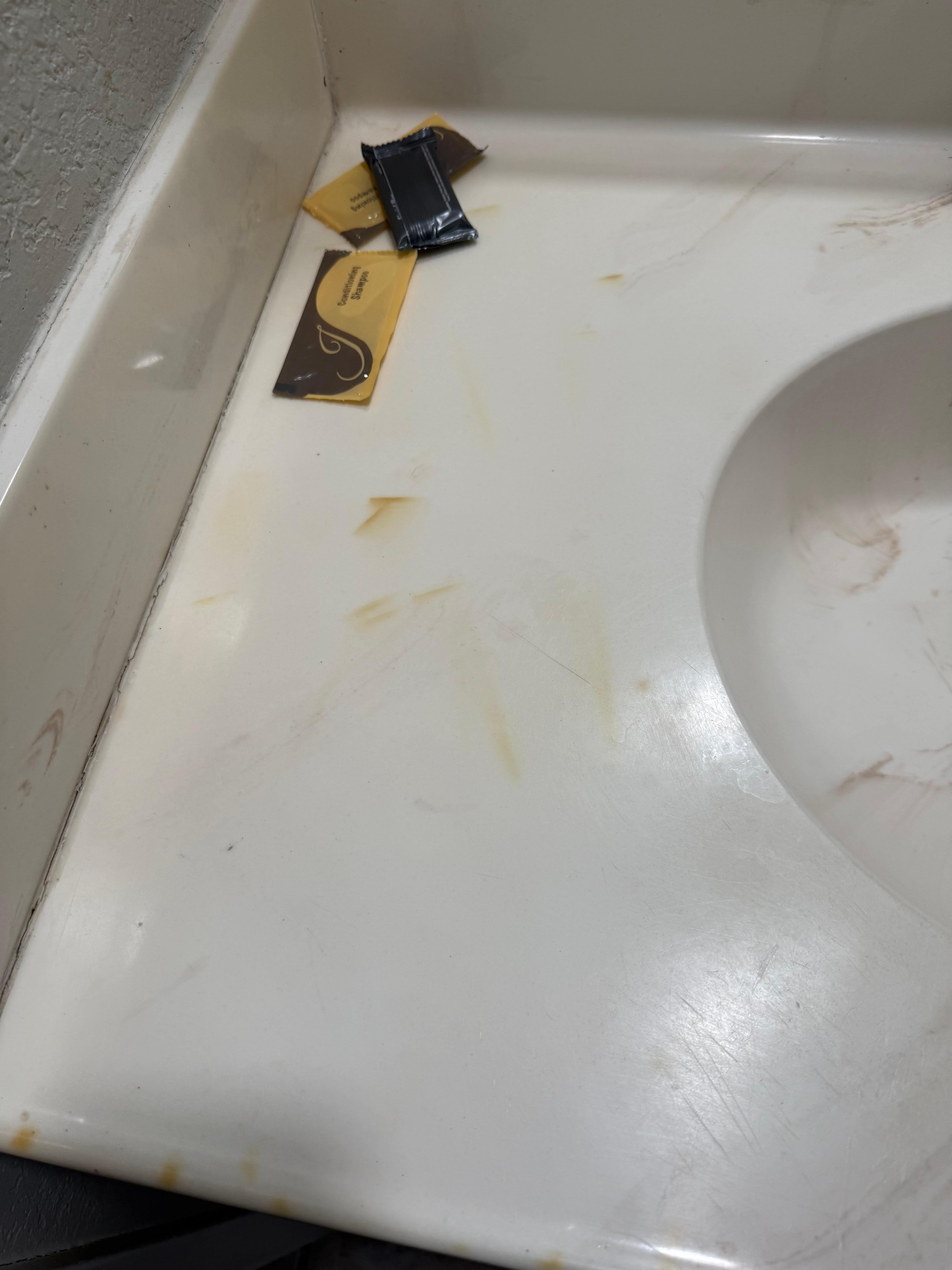 Hard to see but stains and hairs on sink