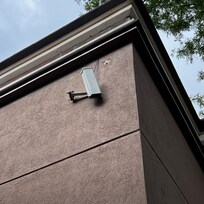 Security cameras broken and hanging