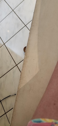 this is showing the dirty ledge next to the bed.