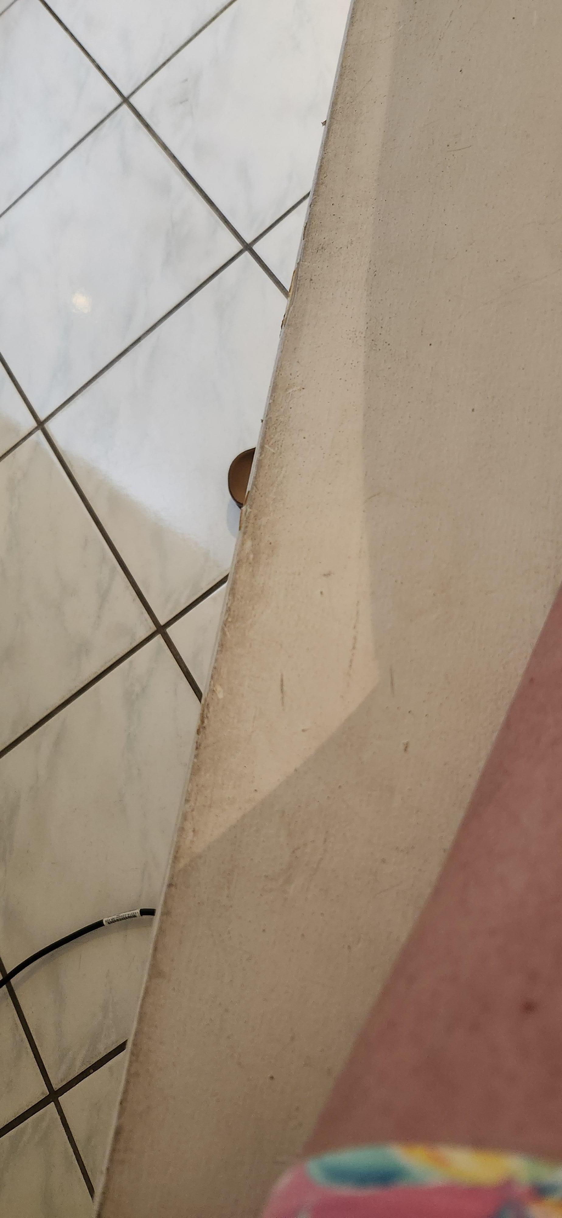 this is showing the dirty ledge next to the bed. 