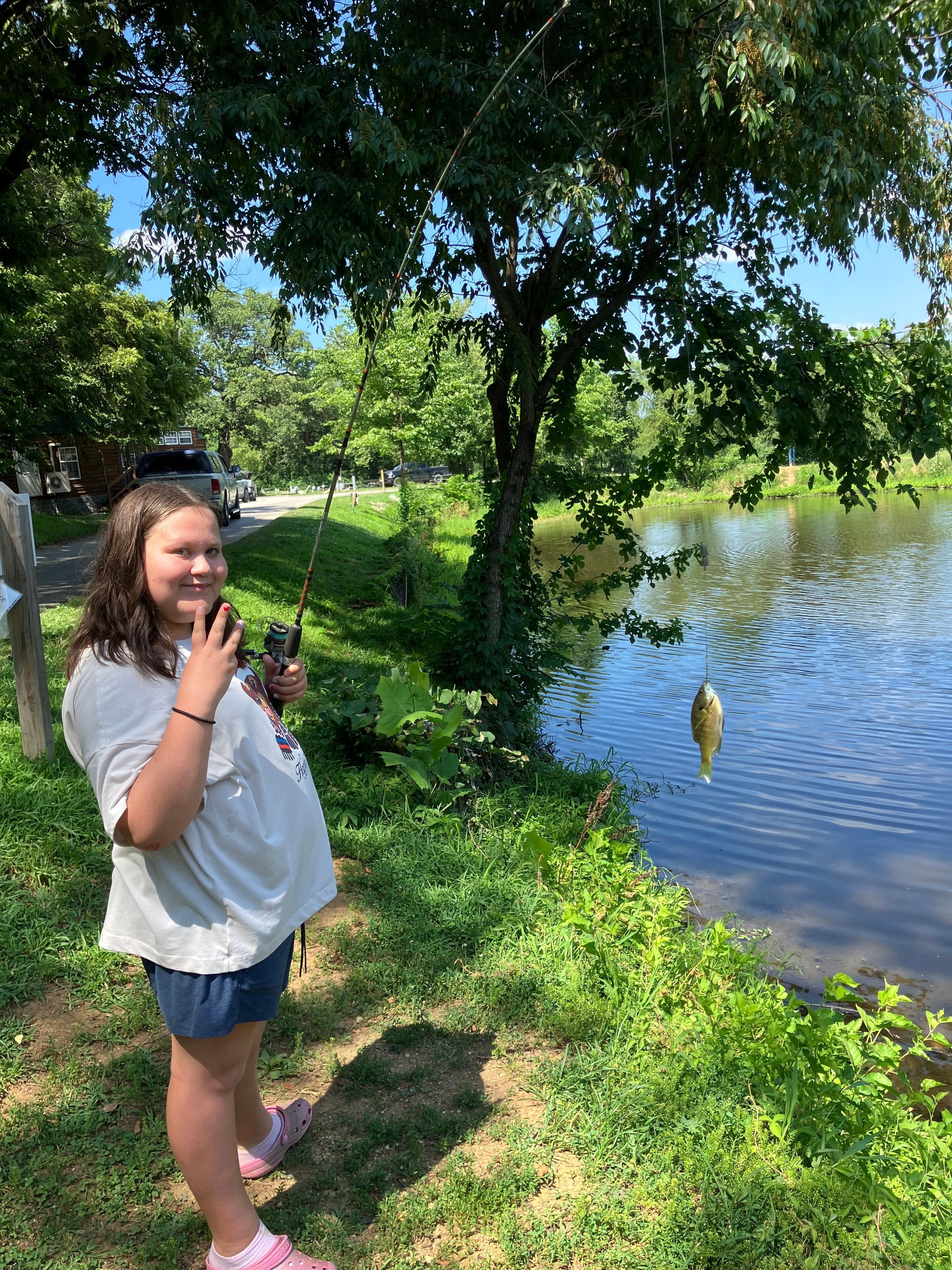 That was her third fish of the day.