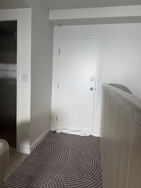 Very loud noise , voices from adjoining room, tv right next to the door, was like a loud speaker.