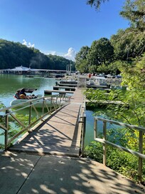 The dock and Bluegill Grill, at the bottom of the cart path!