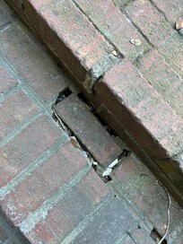 Broken steps at entrance.