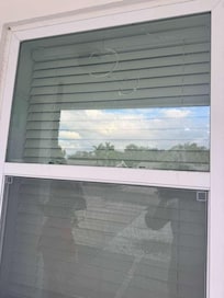 Broken front windows