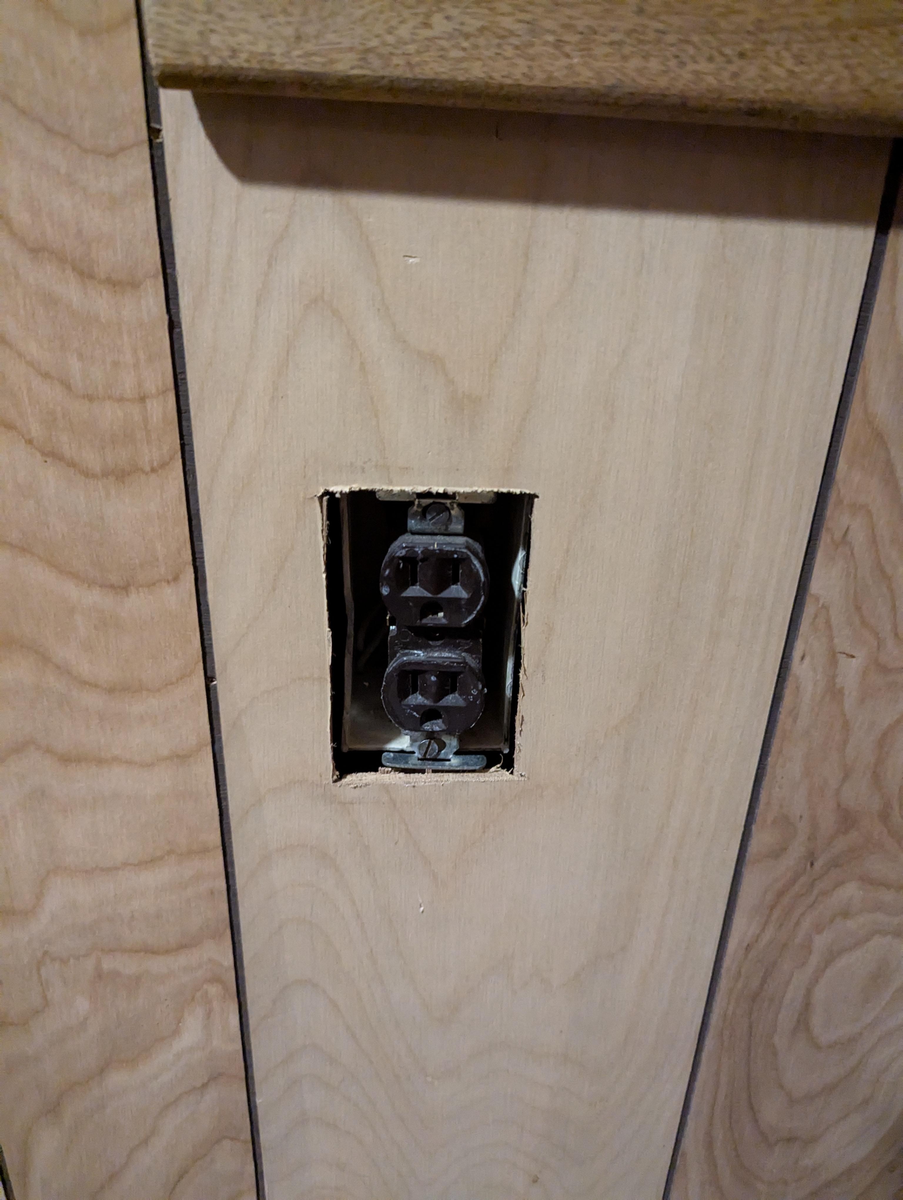 Exposed outlet. There were others that were either exposed or hanging out loose from the wall as well as a whole electrical panel that was exposed in one closet.