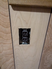 Exposed outlet. There were others that were either exposed or hanging out loose from the wall as well as a whole electrical panel that was exposed in one closet.
