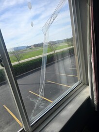Broken taped window