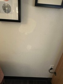 Patches on the wall that have not been painted