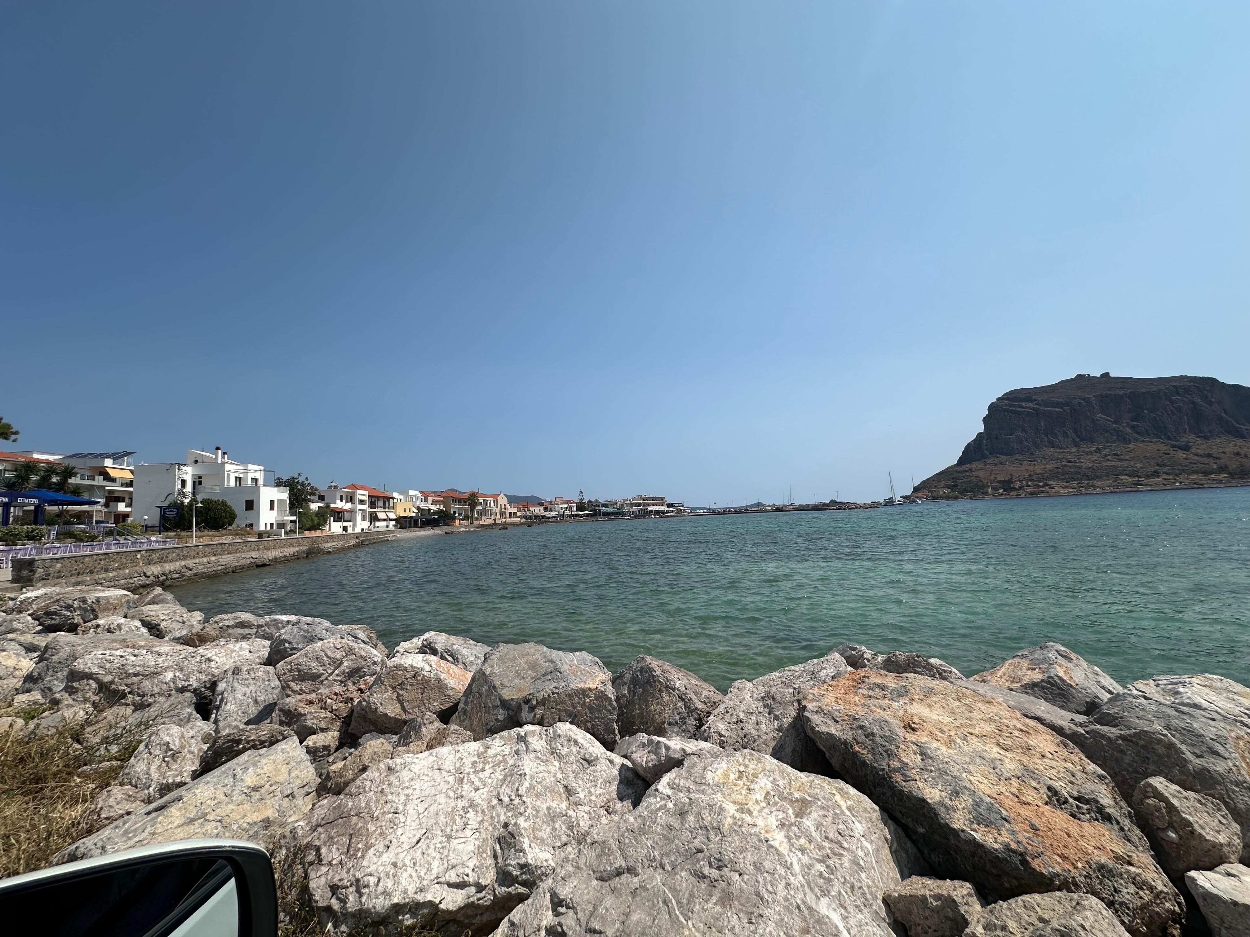 The tavernas along the water, with Monavasia views. 