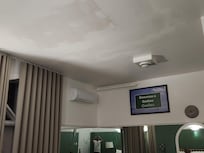 Improperly painted ceiling.