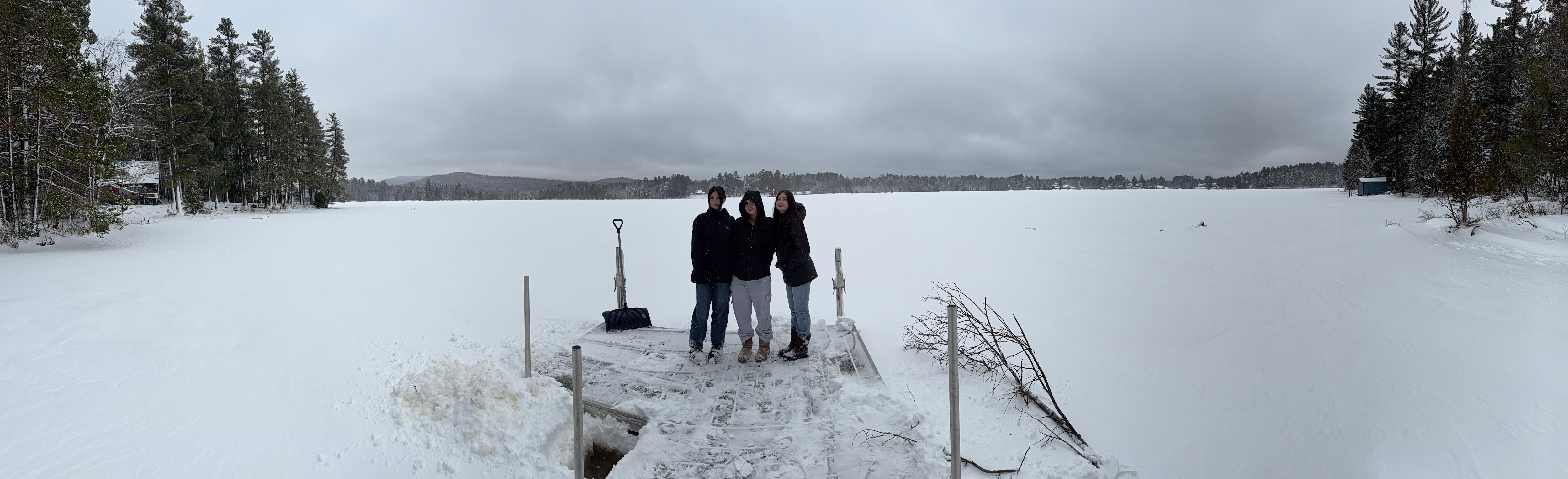 Out on the dock with frozen lake.