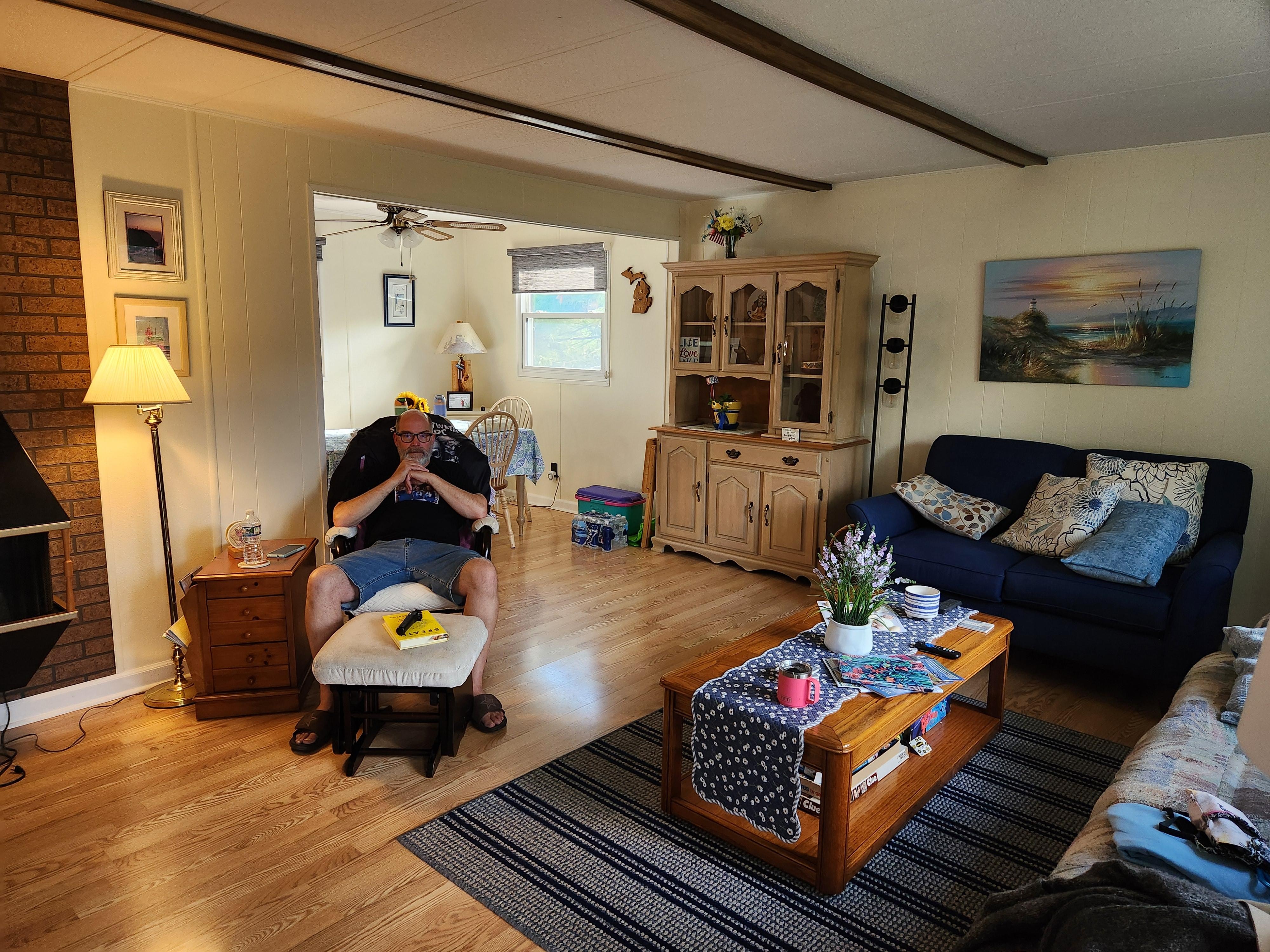 Brother relaxing before shopping with the sisters